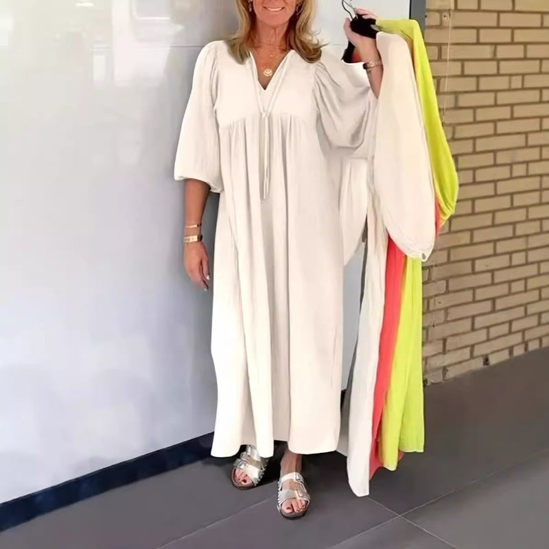 Bąbelkowa sukienka maxi z rękawem 3/4 i dekoltem w serek